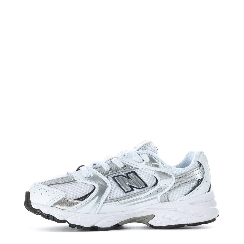 Toddler white and navy New Balance running shoes, mesh upper and rubber traction sole