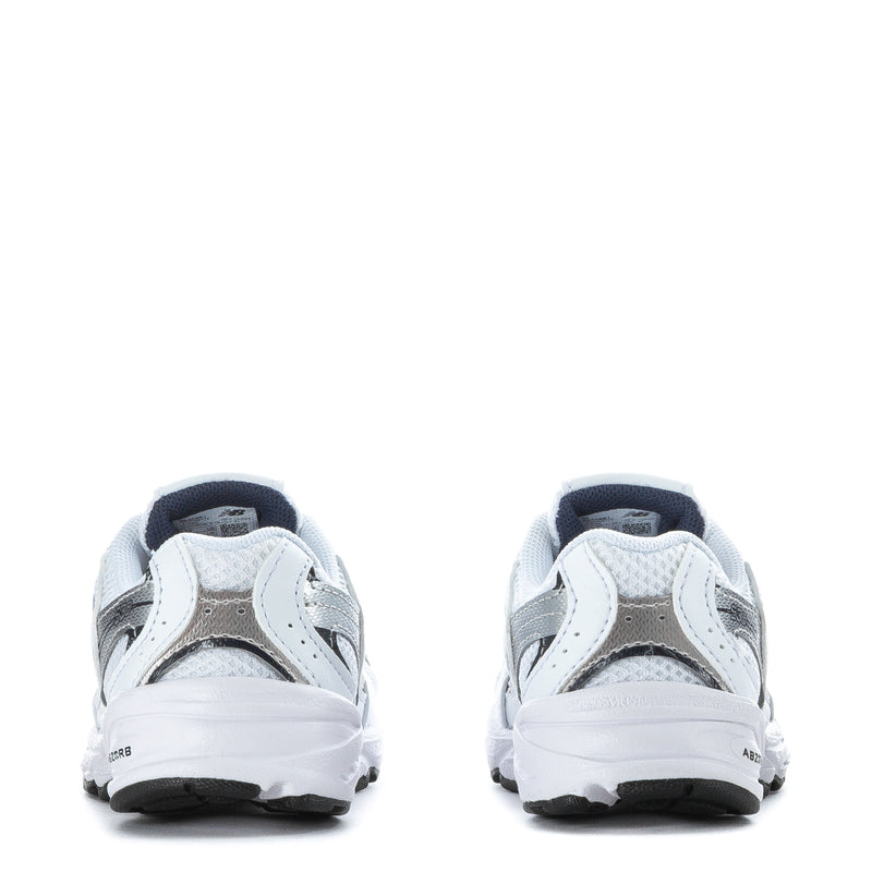 Toddler white and navy New Balance sneakers, rear view with padded heel and laces