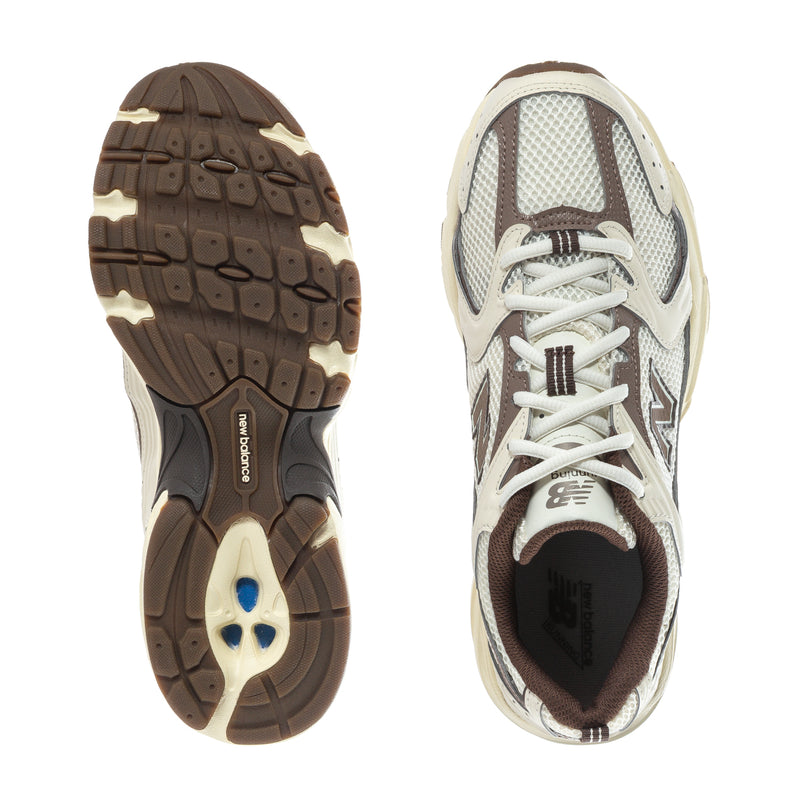 Sneaker outsoles and inner view: treaded rubber sole, cream and brown upper