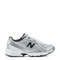 Kids silver metallic lace-up sneakers with black accents and New Balance N logo