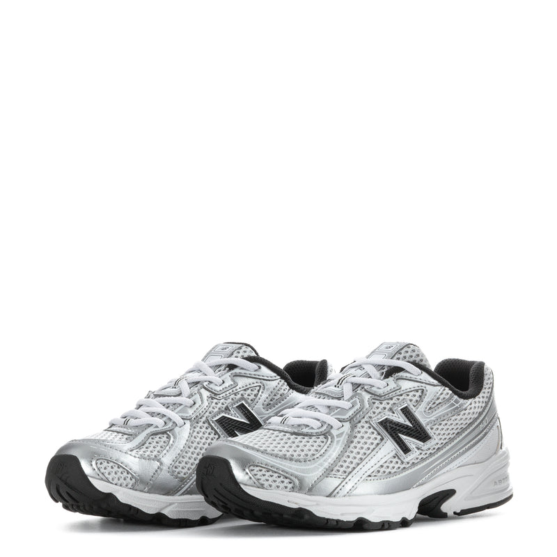Kids silver metallic sneakers, front view with black New Balance N and padded collar