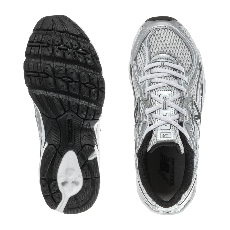 Kids silver metallic sneakers, outsole and heel view with textured black tread