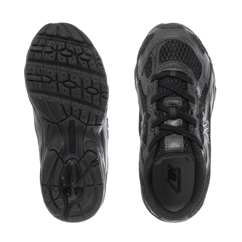 Toddler sneaker outsole and heel interior view in black/gray, lace-up with New Balance
