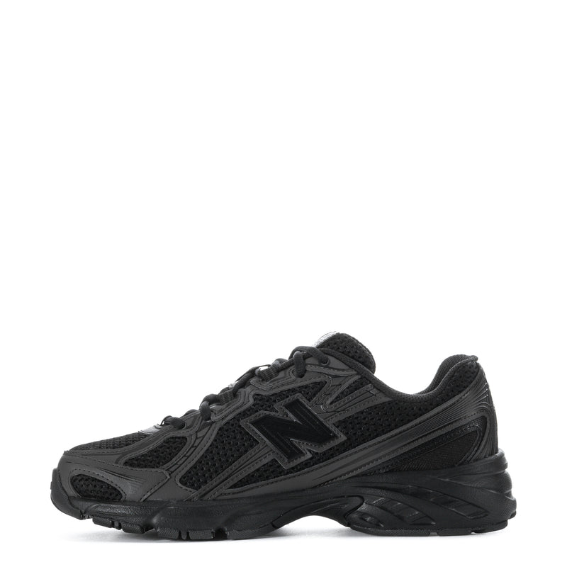 Black and dark gray lace-up running sneakers with chunky rubber sole