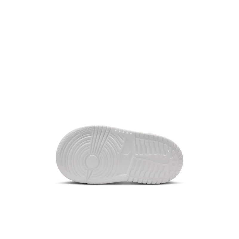 Kids low-top sneakers outsole view in white with textured tread