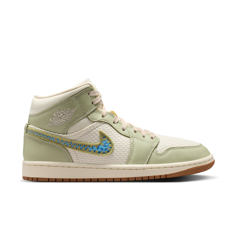 Women’s mid-top sneaker in light olive and white with blue Nike swoosh, lace-up