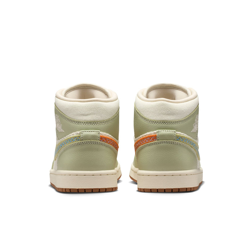 Women’s mid-top sneakers heel view with olive back panels, white collar, brown sole