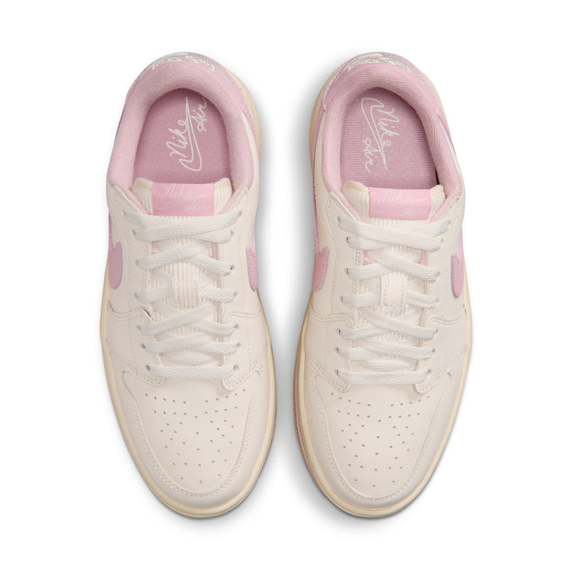 Pale ivory low-top sneakers with pink padded collar and white lace-up design