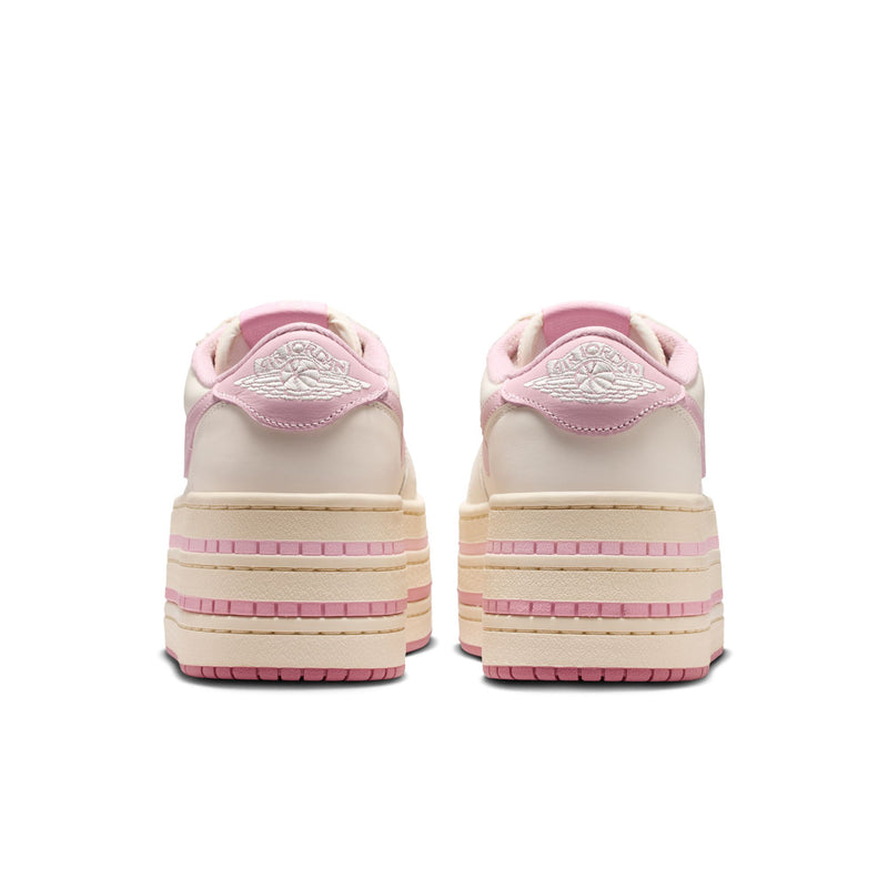 Back view of pale ivory sneakers with pink heel tab and stacked stripe platform