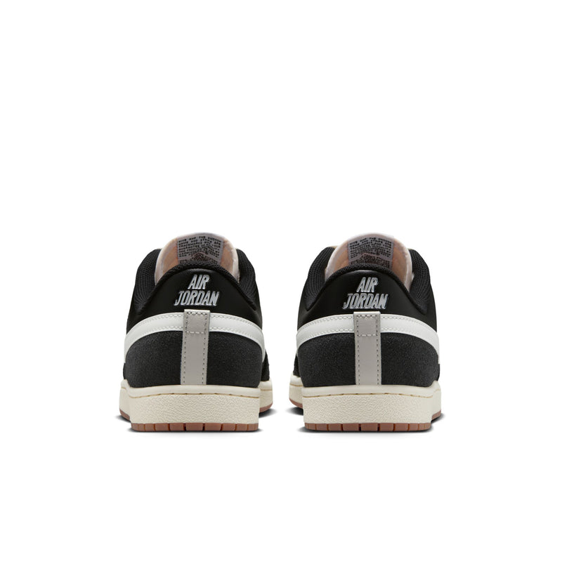 Men's black low-top sneakers with white heel panel, Air Jordan text, gum outsole