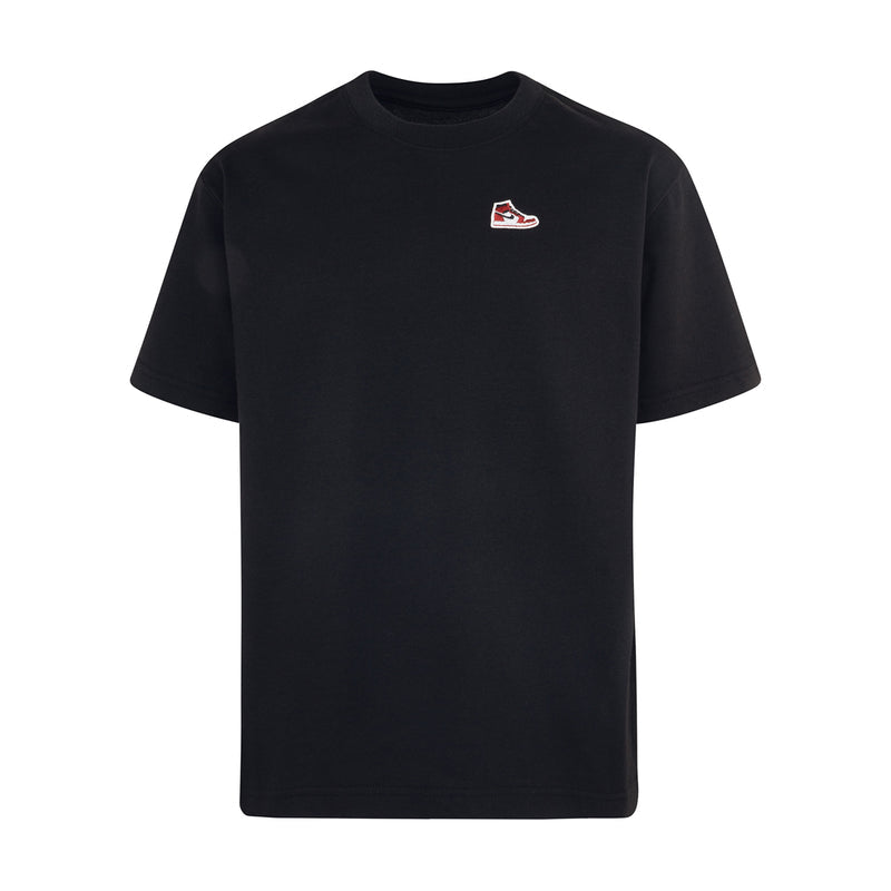 Black youth crewneck t-shirt with small sneaker logo patch on left chest