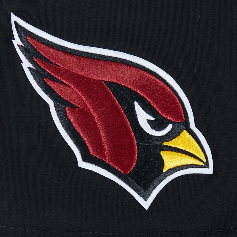 Close-up of Arizona Cardinals bird head logo in red, white, and yellow on black