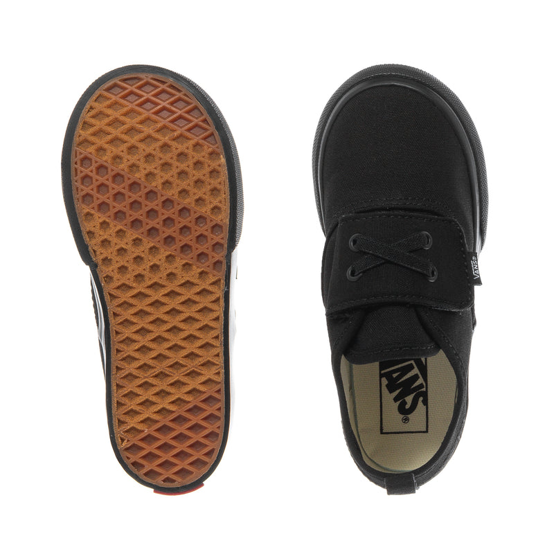 Toddler black sneaker soles view with textured tread and lace-up Vans patch
