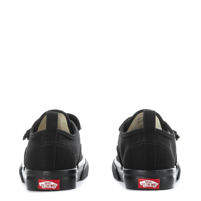 Toddler black low-top sneakers rear view with Vans heel tabs and rubber sole
