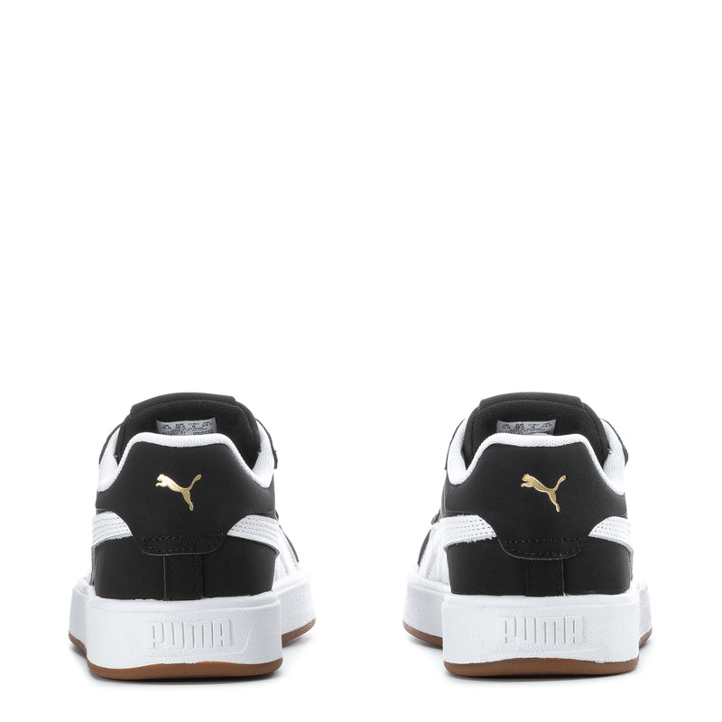 Black Puma low-top sneakers, rear view with white heel accents