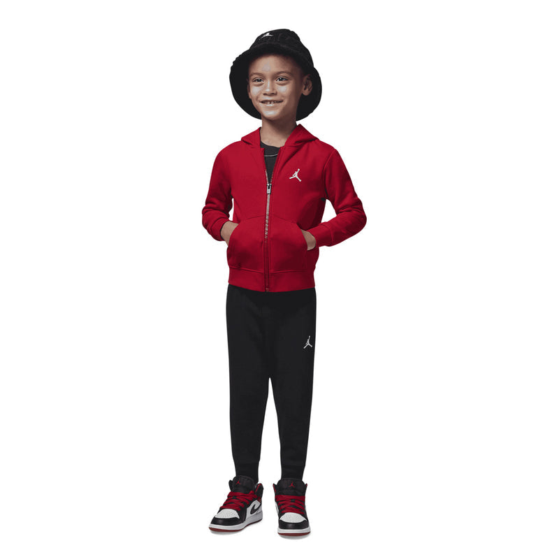 Toddler red zip hoodie and black joggers set with white Jordan emblem, worn by child
