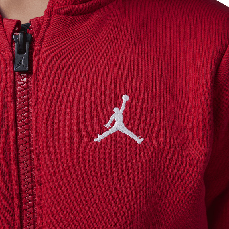 Red fleece zip-up hoodie chest, white Jordan Jumpman logo on front panel
