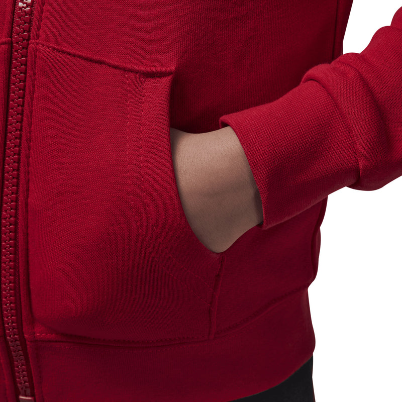 Red fleece hoodie kangaroo pocket and zipper seam detail