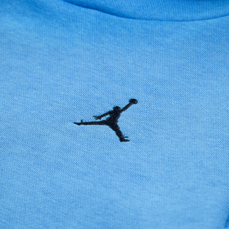 University blue fleece sweatshirt with small black Jordan logo on chest