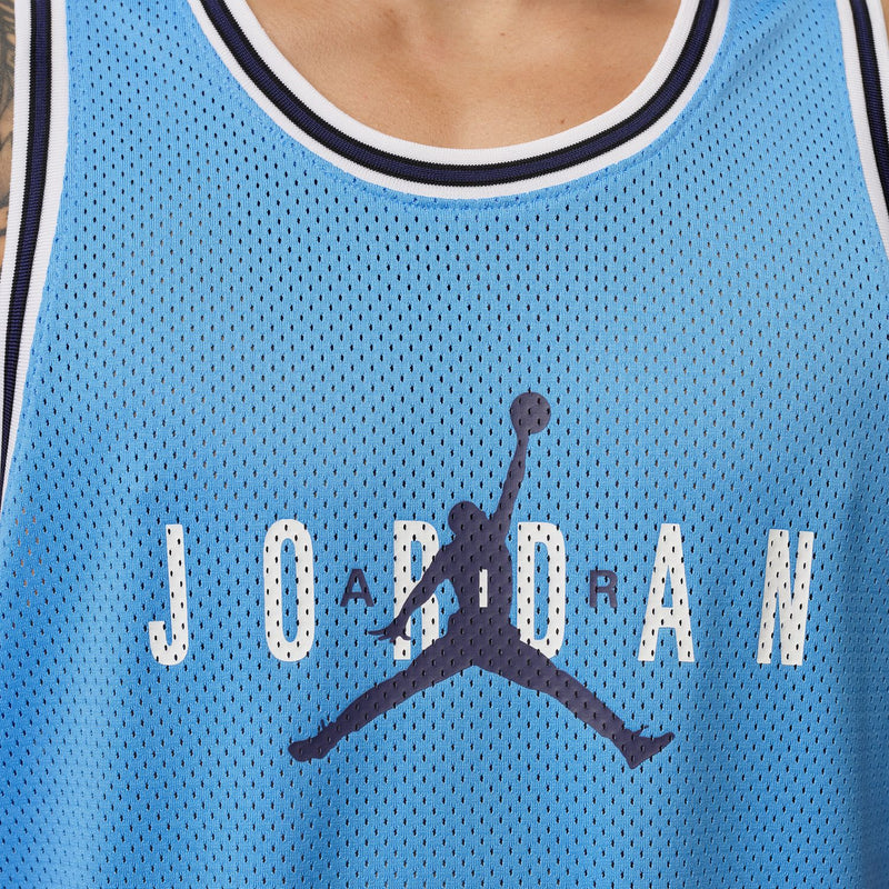 Light blue mesh jersey chest panel with Jumpman Jordan logo and dark trim collar