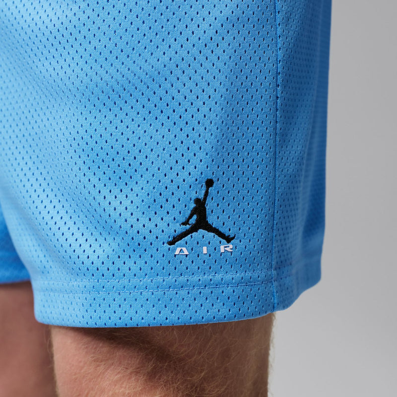 Men's university blue mesh shorts with small Jumpman logo on hem