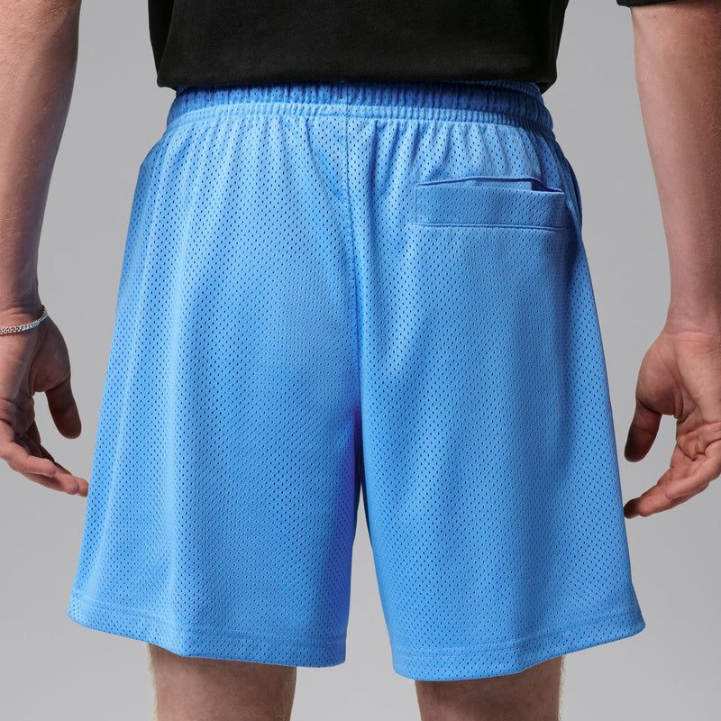 Men's university blue mesh shorts back view with rear pocket and split hem
