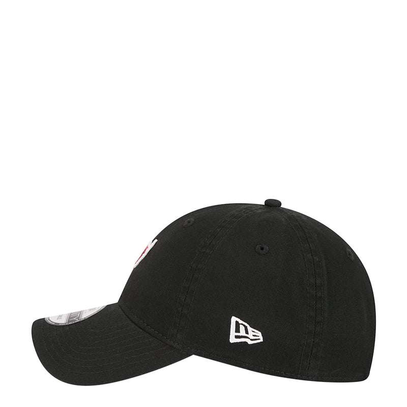 Black baseball cap, angled side view with New Era logo and small Bulls mark