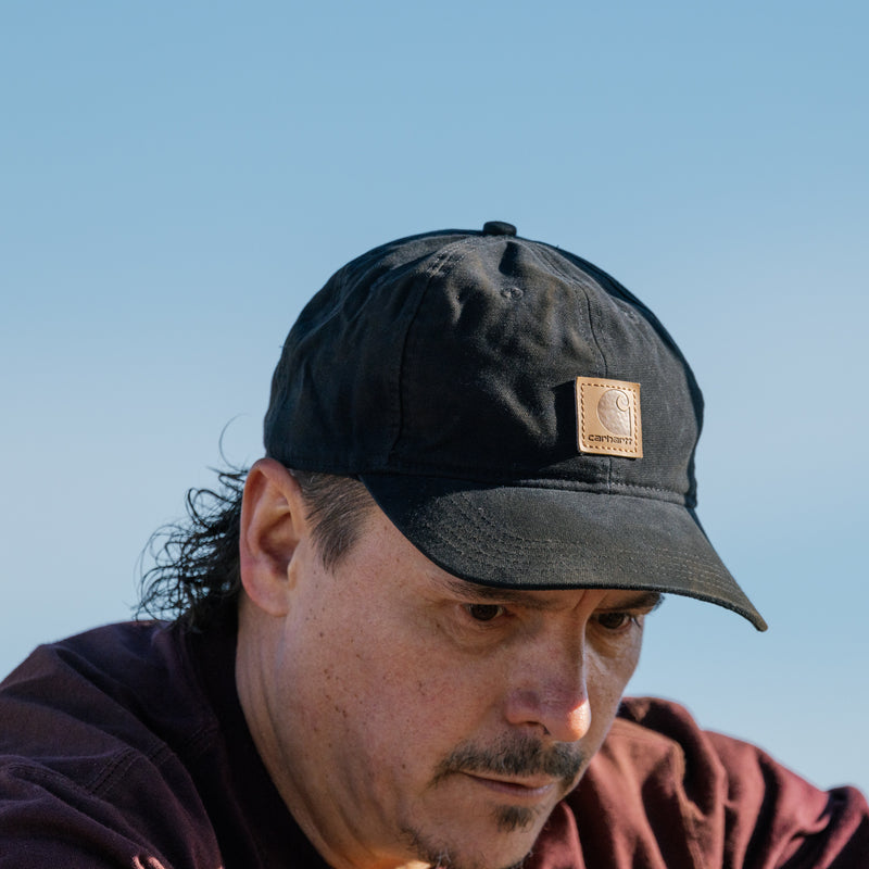 Black canvas dad cap with Carhartt patch and curved brim