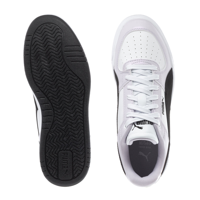 Youth sneakers: black rubber outsole and white upper with lace-up eyelets