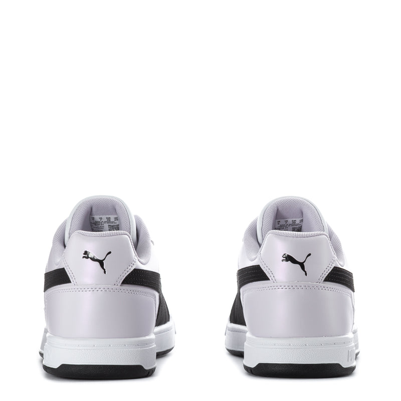 Youth white Puma sneakers with black heel strap and chunky white outsole