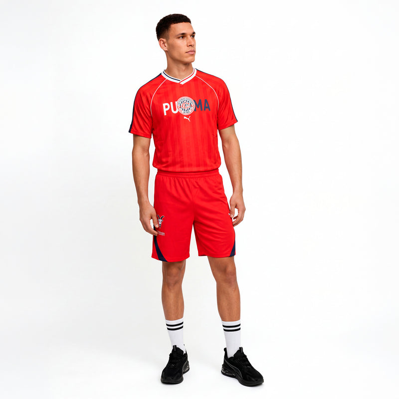 Men's red soccer jersey with V-neck, white trim, and chest crest with Puma mark.