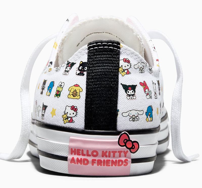 Heel view with black fabric panel and pink 'Hello Kitty and Friends' heel label