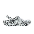 Men's classic clog in black-and-white confetti animal print, slip-on with round toe.