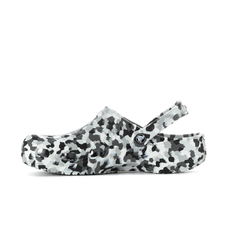 Men's classic clog in black-and-white confetti animal print, side profile with logo.