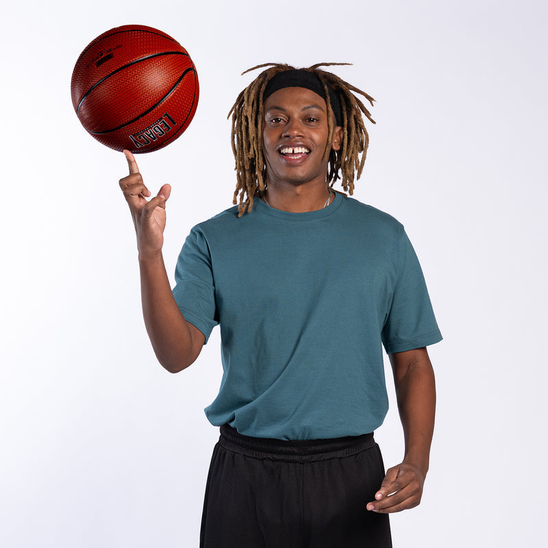 Men's teal crew-neck short-sleeve tee on model, smooth solid fabric