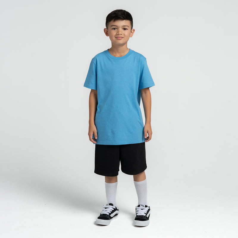 Light blue youth crew-neck T-shirt on model, short sleeves