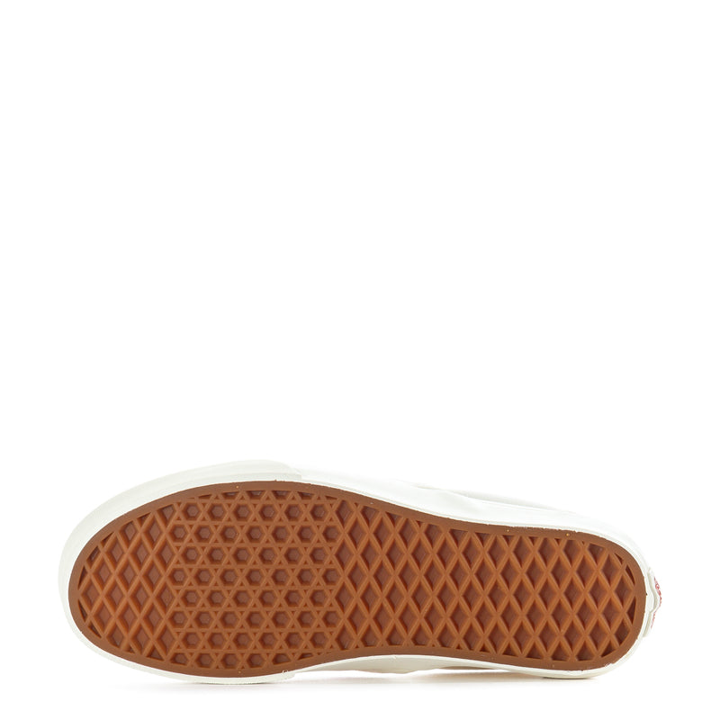Red and white checkered slip-on sneakers with textured rubber outsole