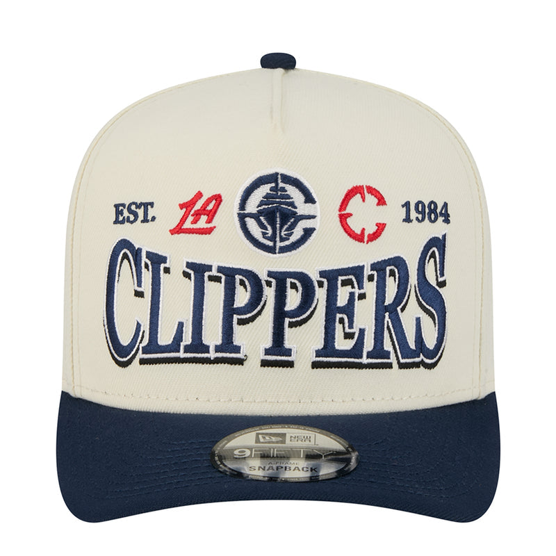 Two-tone A-frame baseball cap, cream crown with navy visor and Clippers logos