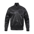 Men's black satin bomber jacket with stand collar, snap buttons, and chest crest patch.