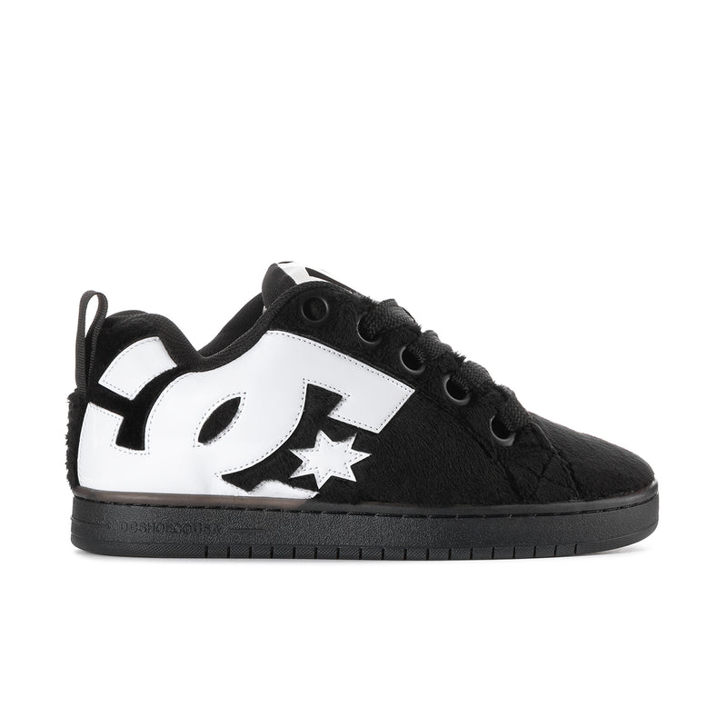 Men's DC low-top skate shoes, black suede with white logo star and side pattern
