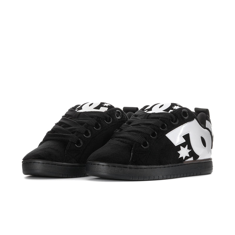 Men's DC low-top skate shoes, black with white DC and star graphics on uppers