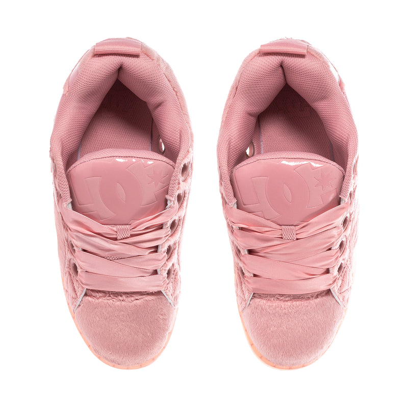 Pink low-top sneakers with open tongue and cushioned interior lining.