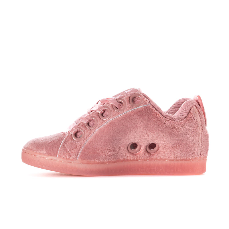 Pink low-top sneaker side view with star emblem and lace-up details.