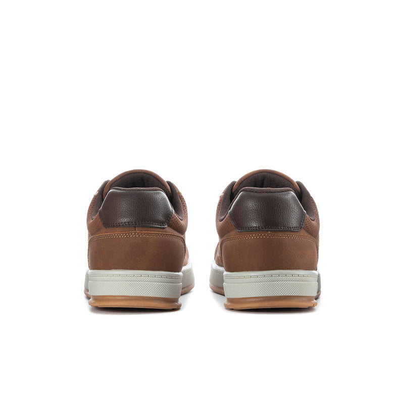 Men's sneakers heel view in tan with chocolate heel caps and white midsole.