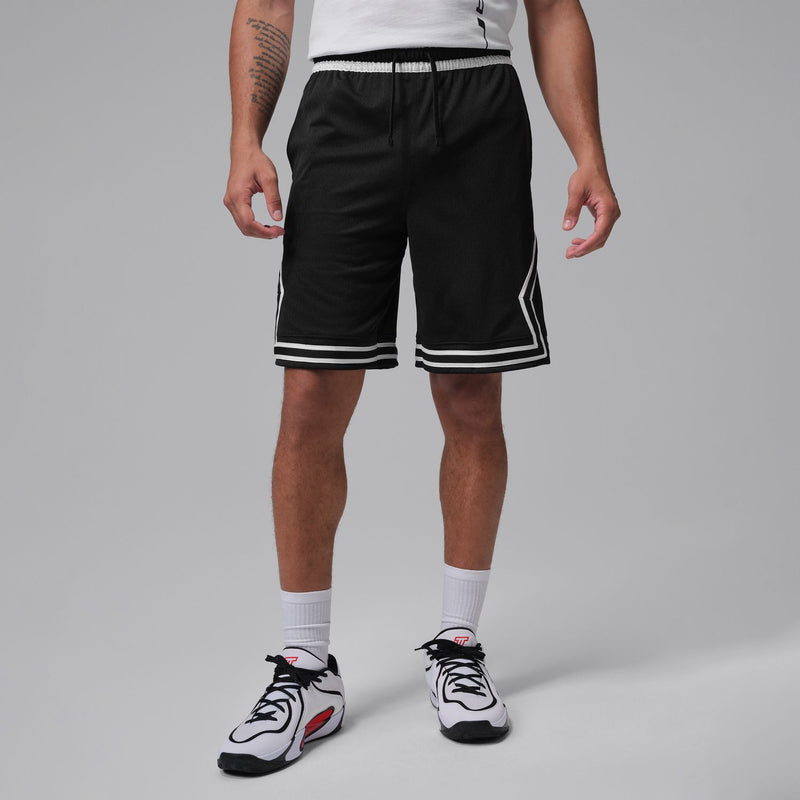 Men's black basketball shorts with white trim and side chevron stripes
