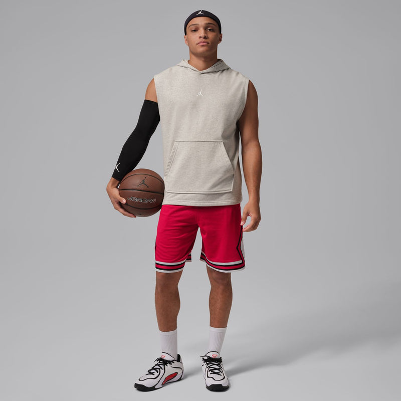 Red men’s basketball shorts with elastic waistband and white-and-black striped hem