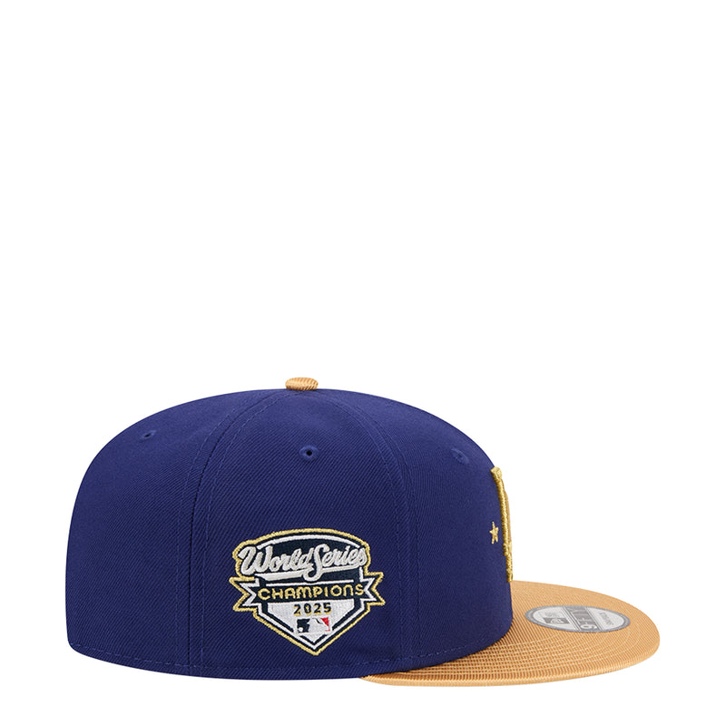 Navy baseball cap with side patch reading World Series Champions 2025 and tan brim
