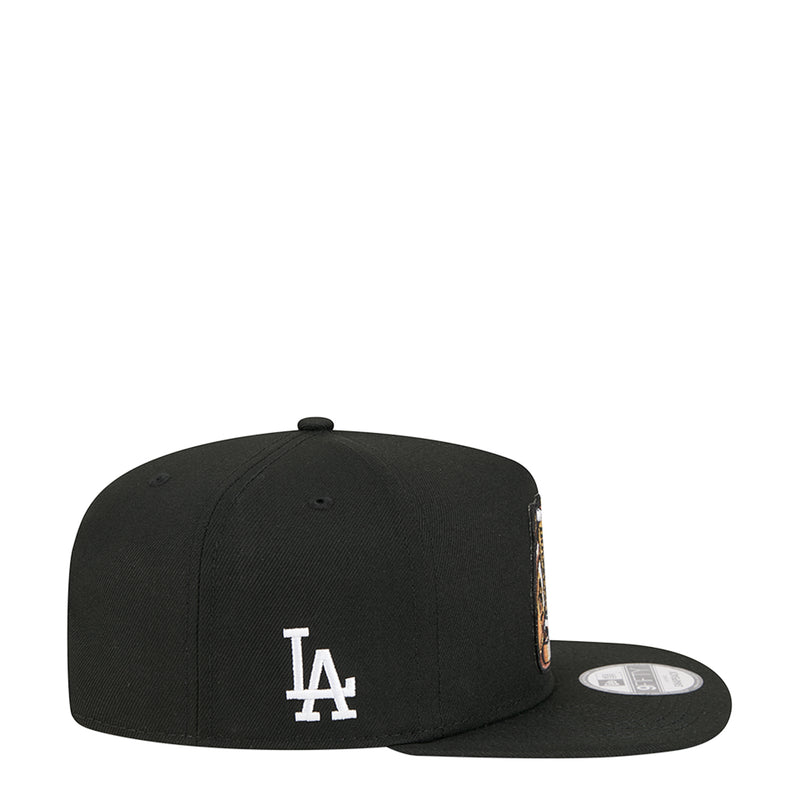 Black baseball cap with white LA monogram on the side
