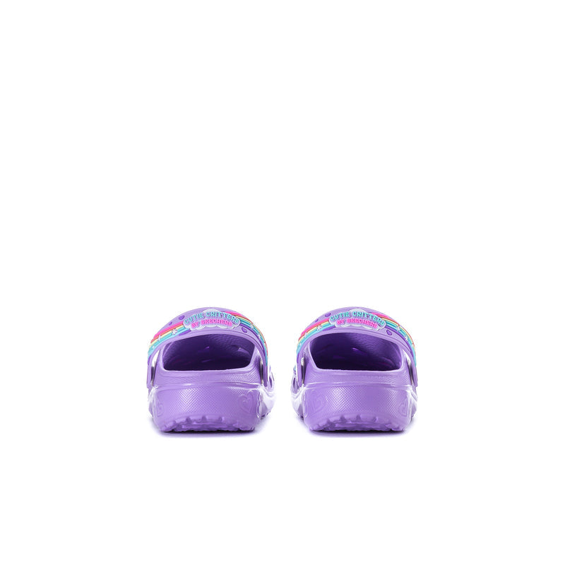 Kids' purple foam clogs from the back, rainbow-edged openings, slip-on design