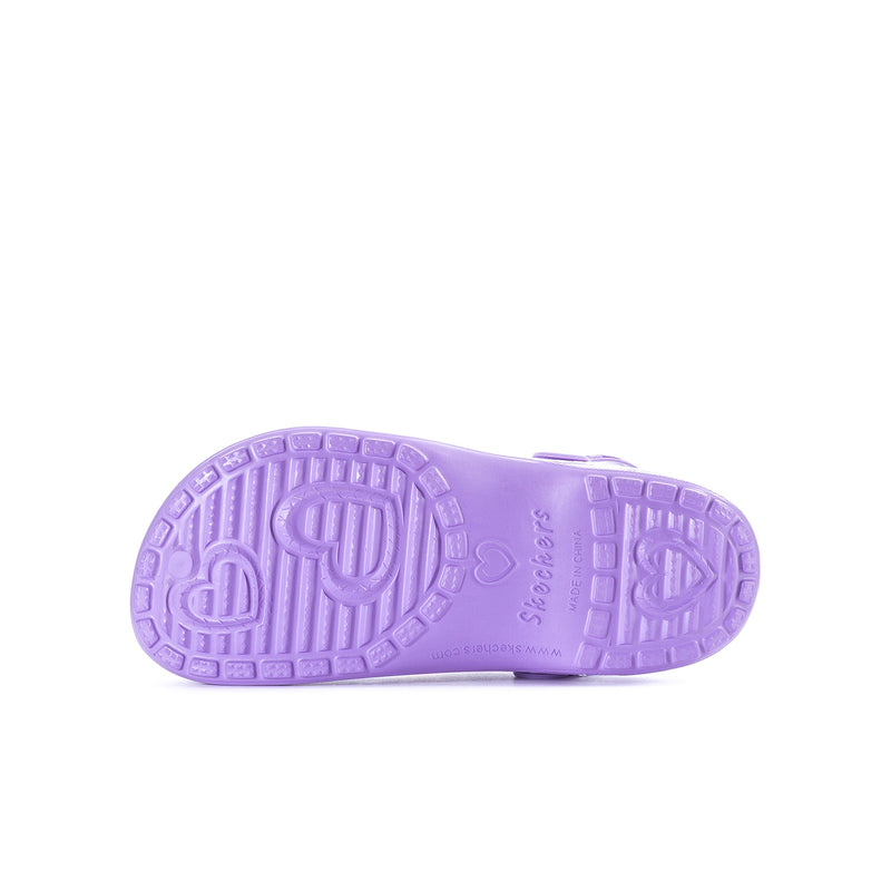 Youth purple clog shoe outsole with textured tread and molded logo details